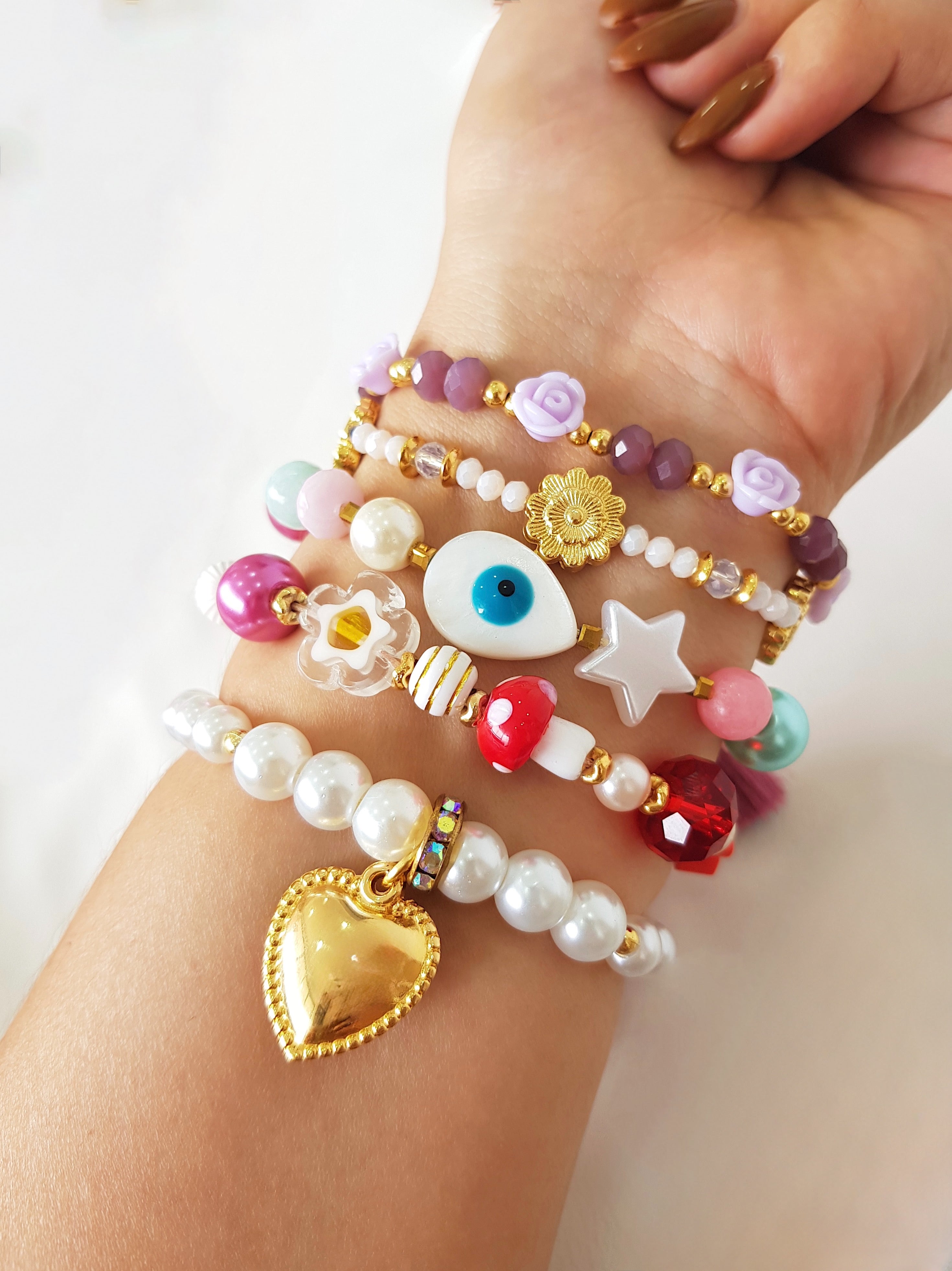 PULSERA ROSITAS LILA